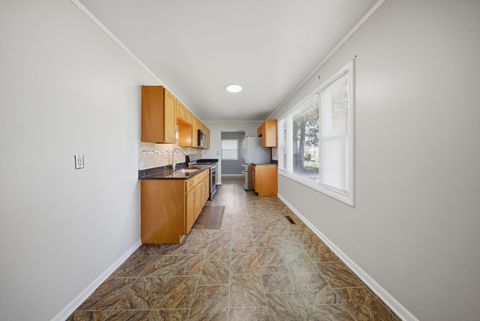 Tiny photo for 117 Hook Road, Carpentersville, IL 60110 (MLS # 12614685)