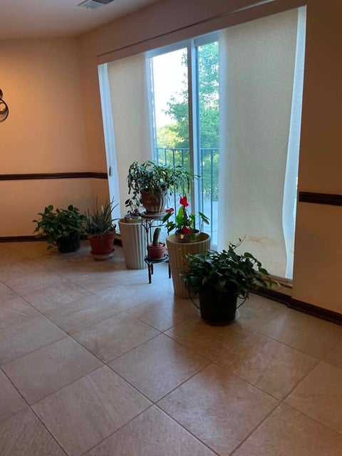 Tiny photo for 815 Leicester Road #214A, Elk Grove Village, IL 60007 (MLS # 12710503)
