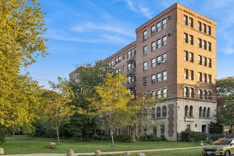 Photo of 3017 E 78th Street #4B, Chicago, IL 60649 (MLS # 12473790)