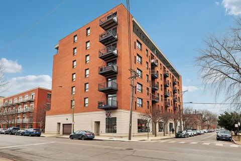 Photo of 974 W 35th Place #302, Chicago, IL 60609 (MLS # 12542766)