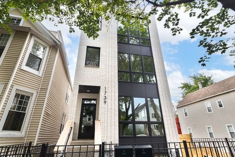 Photo of 1739 N Whipple Street #1, Chicago, IL 60647 (MLS # 12347015)