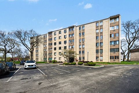 Photo of 9720 S Pulaski Road #102, Oak Lawn, IL 60453 (MLS # 12619759)