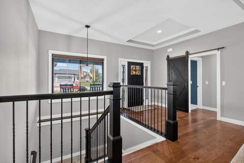 Tiny photo for 7113 Spring Creek Drive, Bettendorf, IA 52722 (MLS # 12705213)