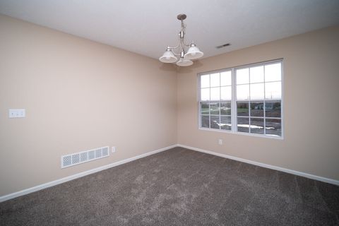 Tiny photo for 600 CLAYTON Circle #A, Sycamore, IL 60178 (MLS # 12498357)