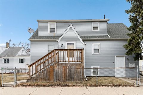 Photo of 3301 N Ozanam Avenue, Chicago, IL 60634 (MLS # 12577423)
