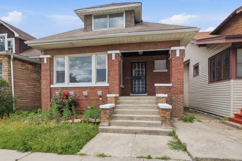Photo of 10742 S Prairie Avenue, Chicago, IL 60628 (MLS # 12665653)