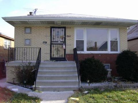 Photo of 5005 S LOCKWOOD Avenue, Chicago, IL 60638 (MLS # 12573265)