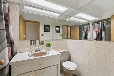 Tiny photo for 16400 University Avenue, South Holland, IL 60473 (MLS # 12642607)