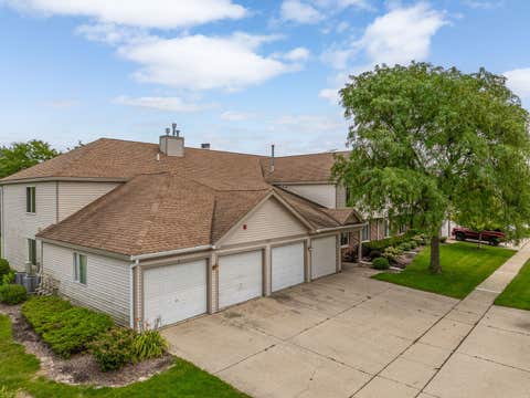Tiny photo for 7050 Newport Drive #101, Woodridge, IL 60517 (MLS # 12692619)