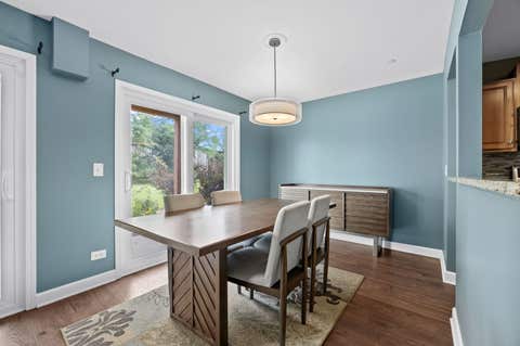 Tiny photo for 7050 Newport Drive #101, Woodridge, IL 60517 (MLS # 12692619)