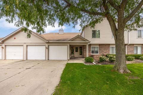 Tiny photo for 7050 Newport Drive #101, Woodridge, IL 60517 (MLS # 12692619)