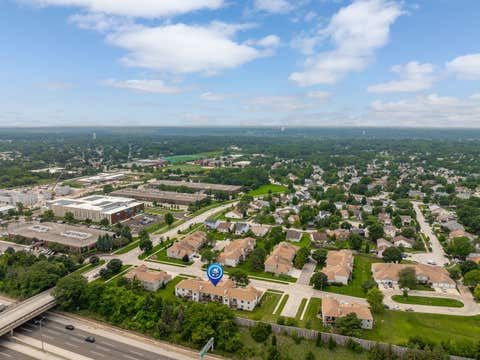Tiny photo for 7050 Newport Drive #101, Woodridge, IL 60517 (MLS # 12692619)