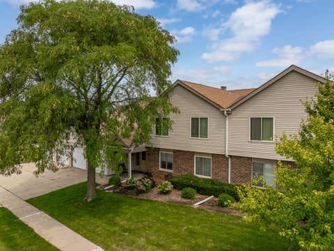 Tiny photo for 7050 Newport Drive #101, Woodridge, IL 60517 (MLS # 12692619)