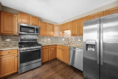 Tiny photo for 7050 Newport Drive #101, Woodridge, IL 60517 (MLS # 12692619)