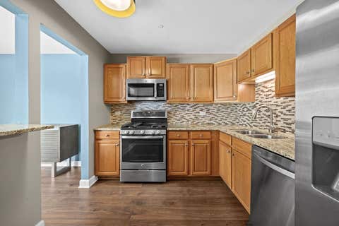 Tiny photo for 7050 Newport Drive #101, Woodridge, IL 60517 (MLS # 12692619)