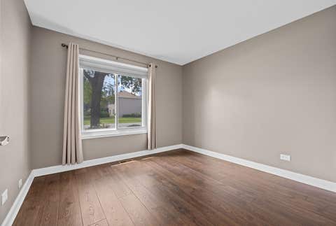 Tiny photo for 7050 Newport Drive #101, Woodridge, IL 60517 (MLS # 12692619)