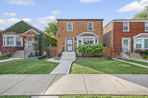 Photo of 10106 S VERNON Avenue, Chicago, IL 60628 (MLS # 12490443)