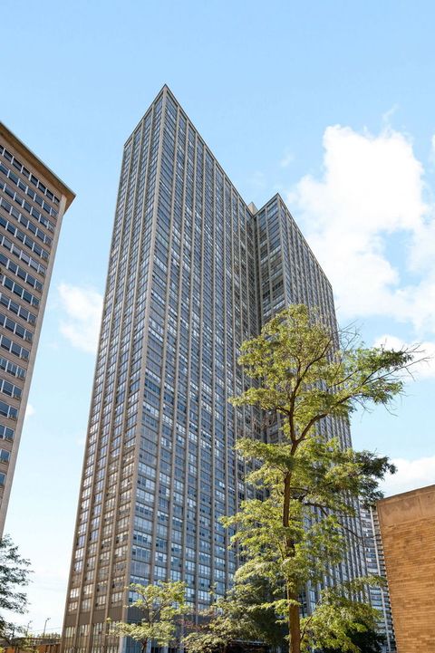 Photo of 655 W IRVING PARK Road #1010, Chicago, IL 60613 (MLS # 12495740)