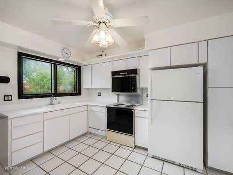 Tiny photo for 4136 Cove Lane #E, Glenview, IL 60025 (MLS # 12726762)