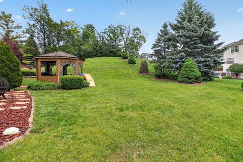Tiny photo for 1001 Oak Ridge Drive, Streamwood, IL 60107 (MLS # 12625513)