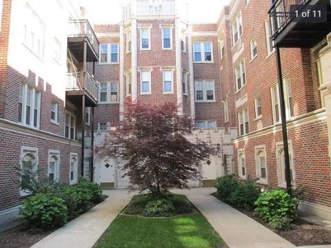 Photo of 2315 E 70th Place #213, Chicago, IL 60649 (MLS # 12432691)