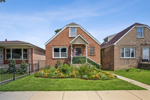 Photo of 10029 S Indiana Avenue, Chicago, IL 60628 (MLS # 12699565)