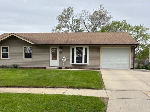 Photo of 302 RIDGE Circle, Streamwood, IL 60107 (MLS # 12640482)