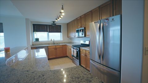 Tiny photo for 1 Itasca Place #408, Itasca, IL 60143 (MLS # 12439345)