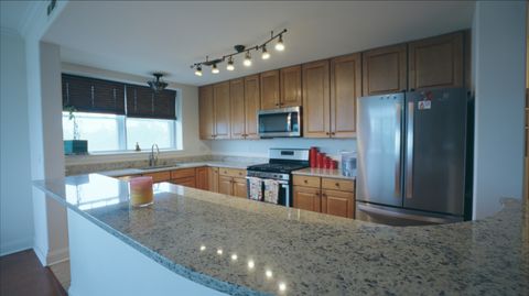 Tiny photo for 1 Itasca Place #408, Itasca, IL 60143 (MLS # 12439345)