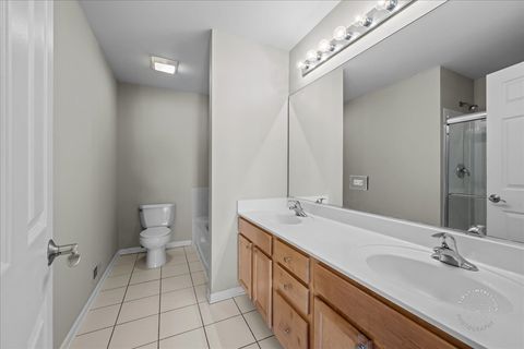 Tiny photo for 628 Lincoln Station Drive #628, Oswego, IL 60543 (MLS # 12591430)