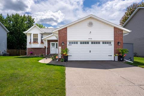 Photo of 6526 Silvercreek Drive, Davenport, IA 52806 (MLS # 12709796)