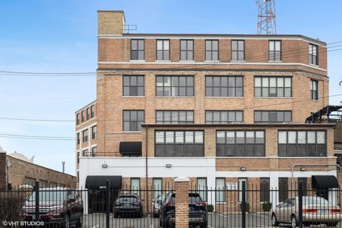 Photo of 2675 W Grand Avenue #302, Chicago, IL 60612 (MLS # 12484114)