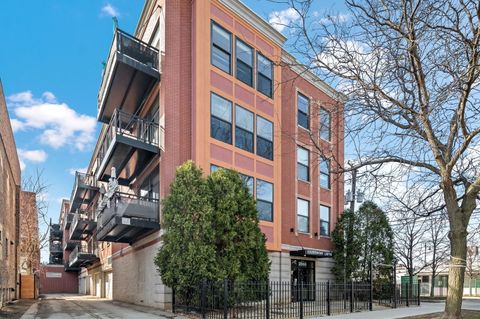 Photo of 3944 N CLAREMONT Avenue #408, Chicago, IL 60618 (MLS # 12595063)