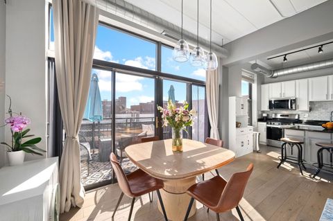 Tiny photo for 3944 N CLAREMONT Avenue #408, Chicago, IL 60618 (MLS # 12595063)