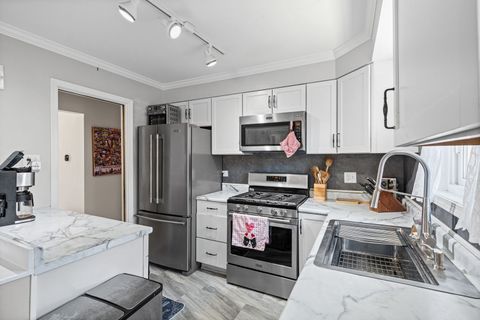Tiny photo for 7139 N Nagle Avenue, Chicago, IL 60646 (MLS # 12626052)