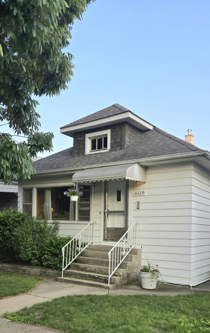 6119 W School Street