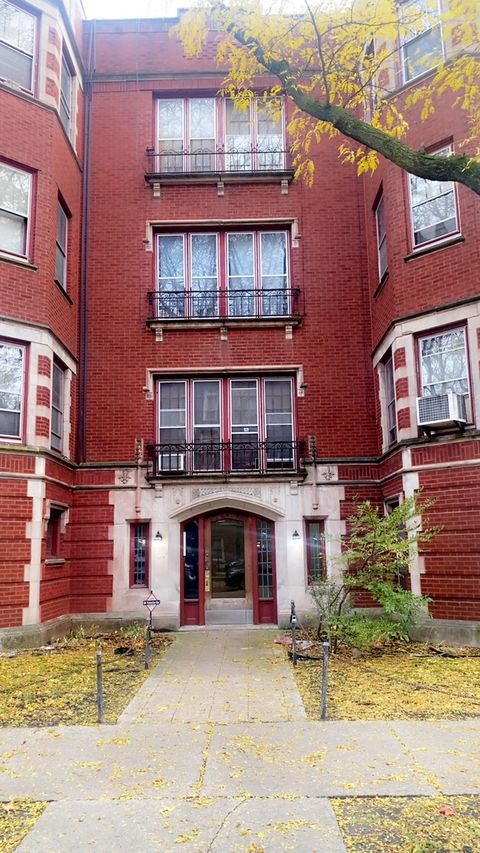 Photo of 2233 E 70th Place #1, Chicago, IL 60649 (MLS # 12514745)