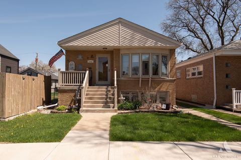 Photo of 5555 S Menard Avenue, Chicago, IL 60638 (MLS # 12628371)