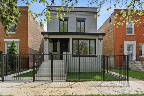 Photo of 6333 S Maplewood Avenue, Chicago, IL 60629 (MLS # 12640843)