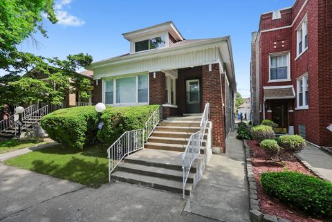 Photo of 7627 S Ridgeland Avenue, Chicago, IL 60649 (MLS # 12490602)