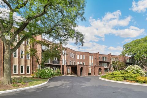 Photo of 1550 Sandpebble Drive #307, Wheeling, IL 60090 (MLS # 12453447)