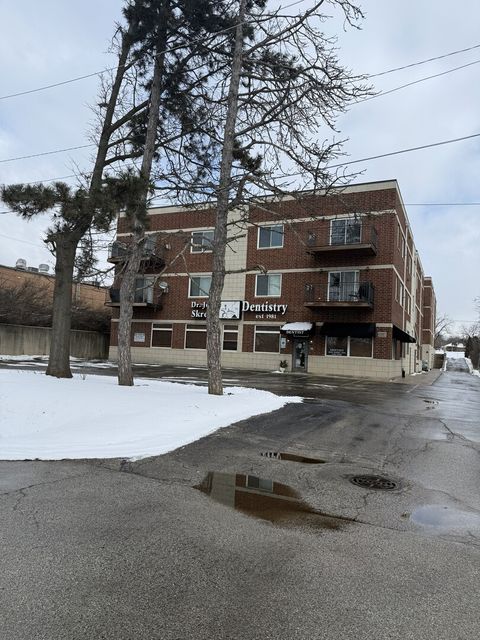 Photo of 6961 Vine Street #303, Indian Head Park, IL 60525 (MLS # 12559058)