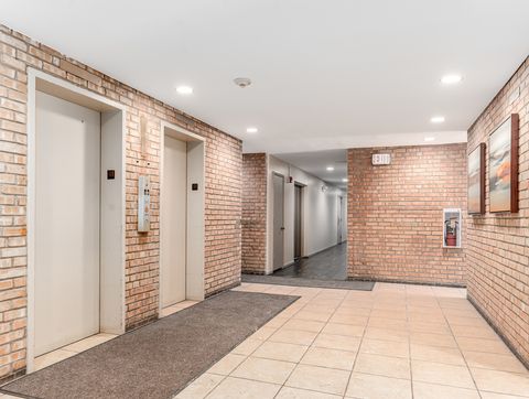 Tiny photo for 5900 OAKWOOD Drive #1E, Lisle, IL 60532 (MLS # 12542582)