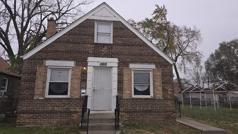 Photo of 10221 S Hoxie Avenue, Chicago, IL 60617 (MLS # 12521952)