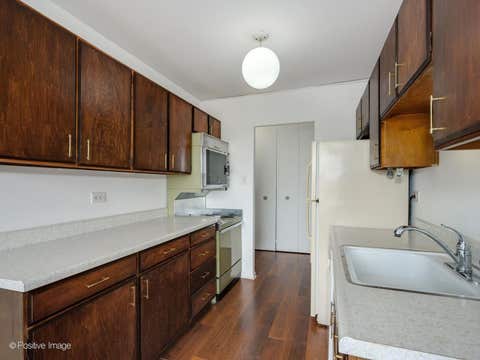 Tiny photo for 7061 N KEDZIE Avenue #410, Chicago, IL 60645 (MLS # 12652535)