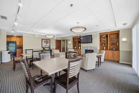 Tiny photo for 6420 DOUBLE EAGLE Drive #414, Woodridge, IL 60517 (MLS # 12636230)