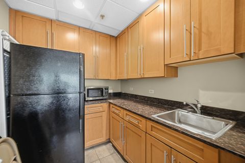 Tiny photo for 6420 DOUBLE EAGLE Drive #414, Woodridge, IL 60517 (MLS # 12636230)