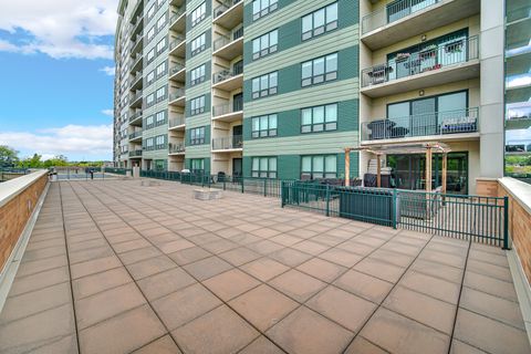 Tiny photo for 6420 DOUBLE EAGLE Drive #414, Woodridge, IL 60517 (MLS # 12636230)