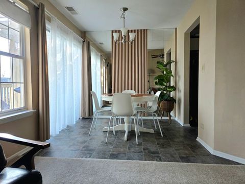 Tiny photo for 1914 Quaker Hollow Lane, Streamwood, IL 60107 (MLS # 12603046)