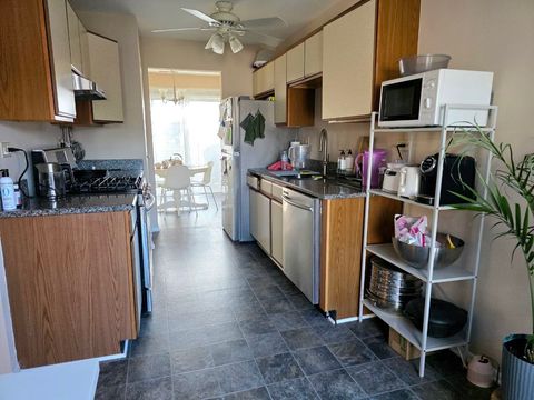 Tiny photo for 1914 Quaker Hollow Lane, Streamwood, IL 60107 (MLS # 12603046)